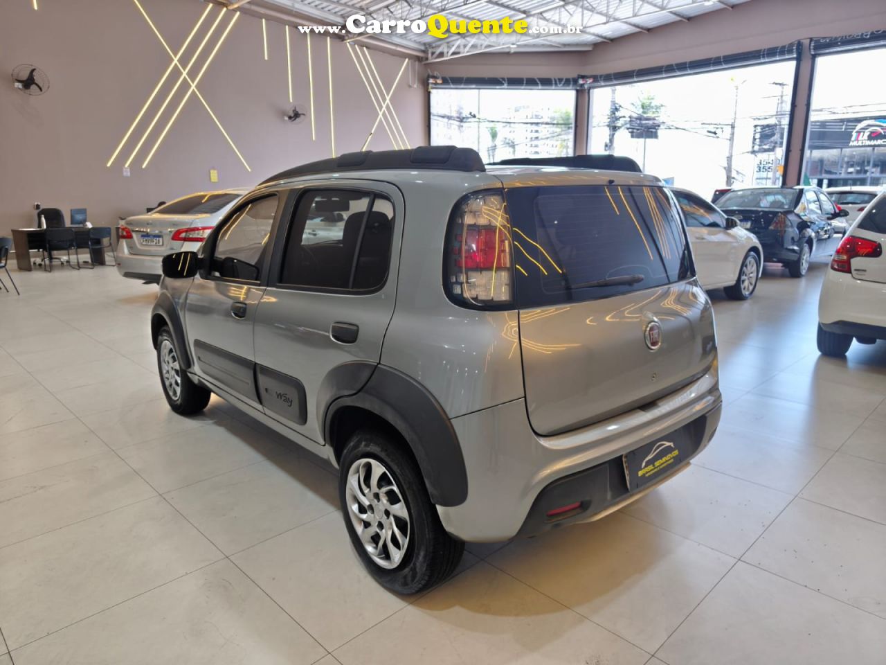 FIAT   UNO SPORTING    CINZA 2013 1.4 FLEX - Loja