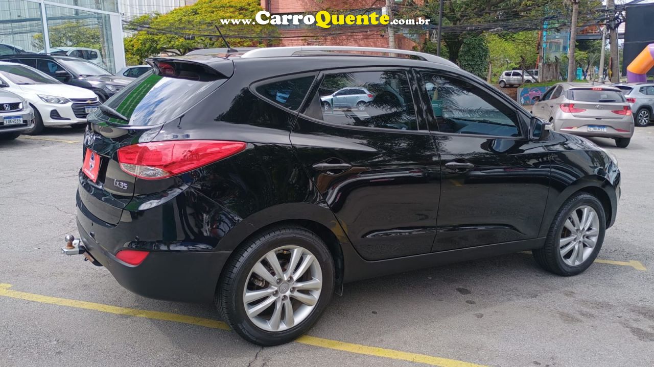 HYUNDAI   IX35 2.0 16V 170CV 2WD4WD AUT.   PRETO 2011 2.0 GASOLINA - Loja