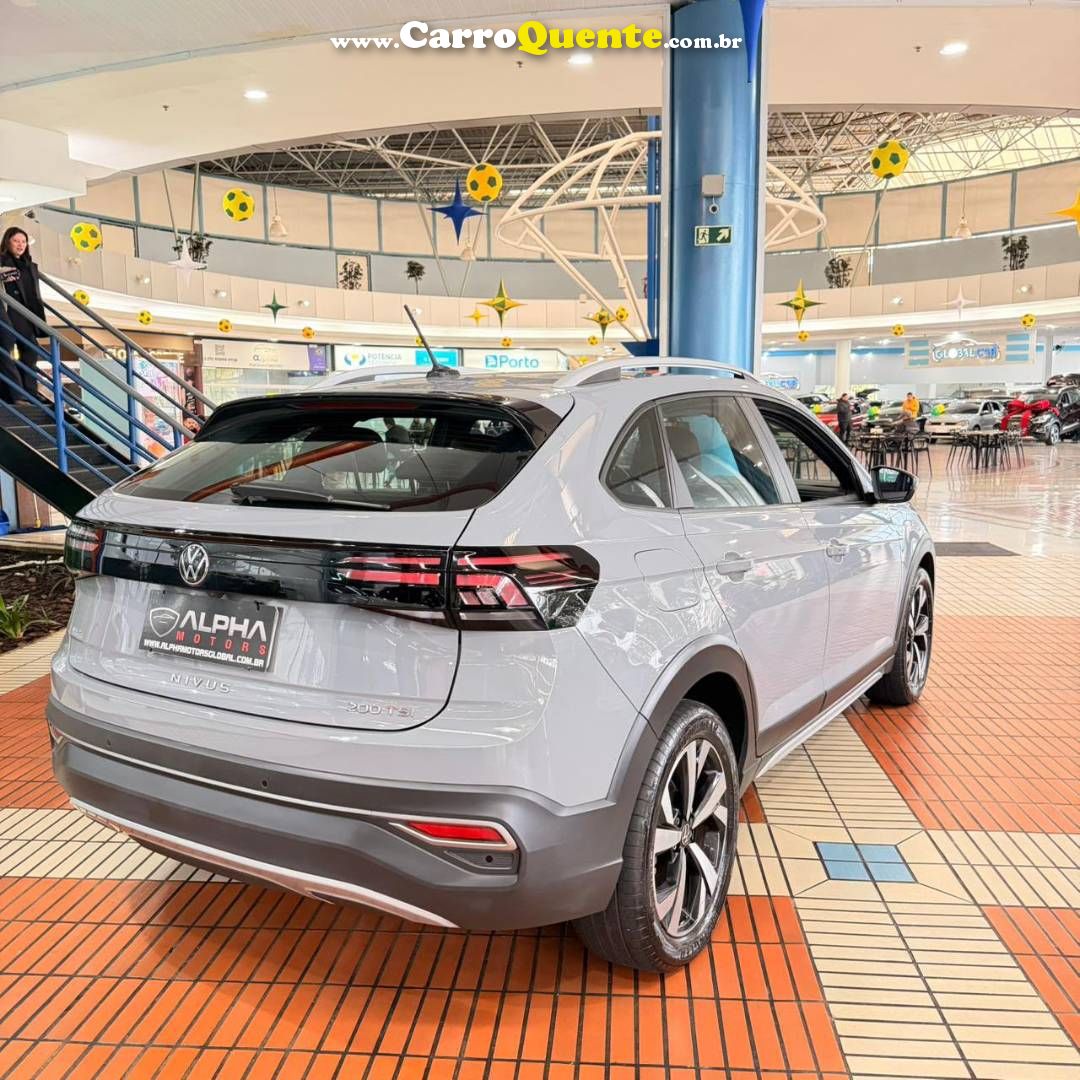 VOLKSWAGEN NIVUS 1.0 200 TSI TOTAL HIGHLINE 2023 - Loja