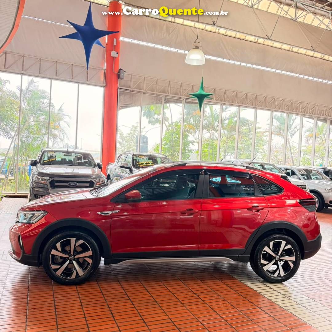 VOLKSWAGEN NIVUS 1.0 200 TSI TOTAL HIGHLINE 2023 - Loja