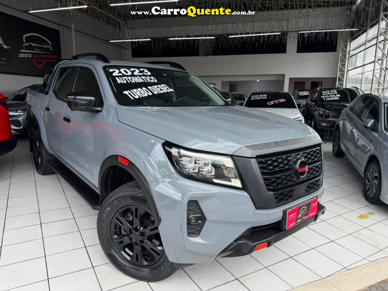 NISSAN   FRONTIER PRO4X CD 4X4 2.3 BI-TB DIE. AUT   CINZA 2023 2.3 GASOLINA - Loja