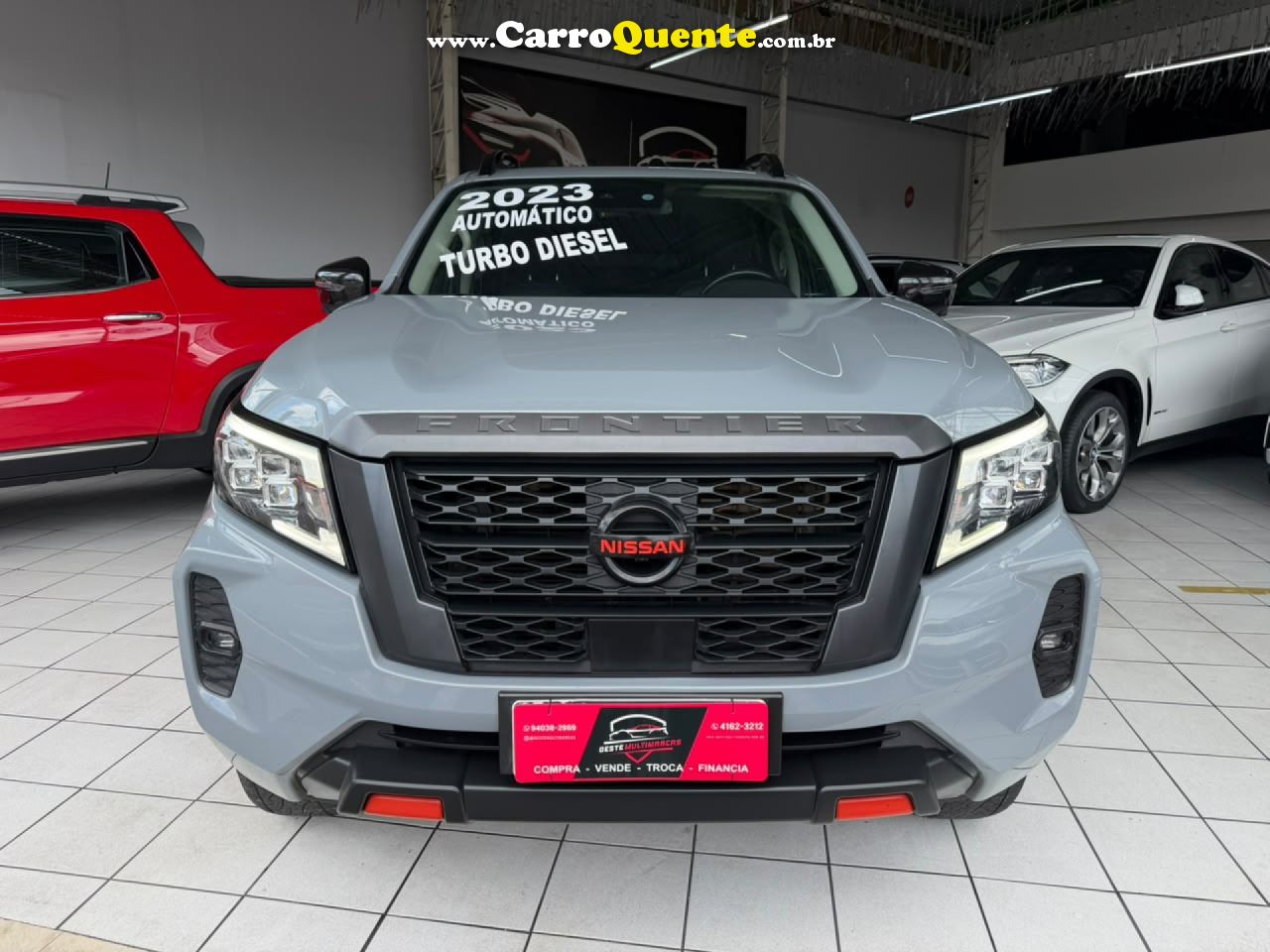 NISSAN   FRONTIER PRO4X CD 4X4 2.3 BI-TB DIE. AUT   CINZA 2023 2.3 GASOLINA - Loja