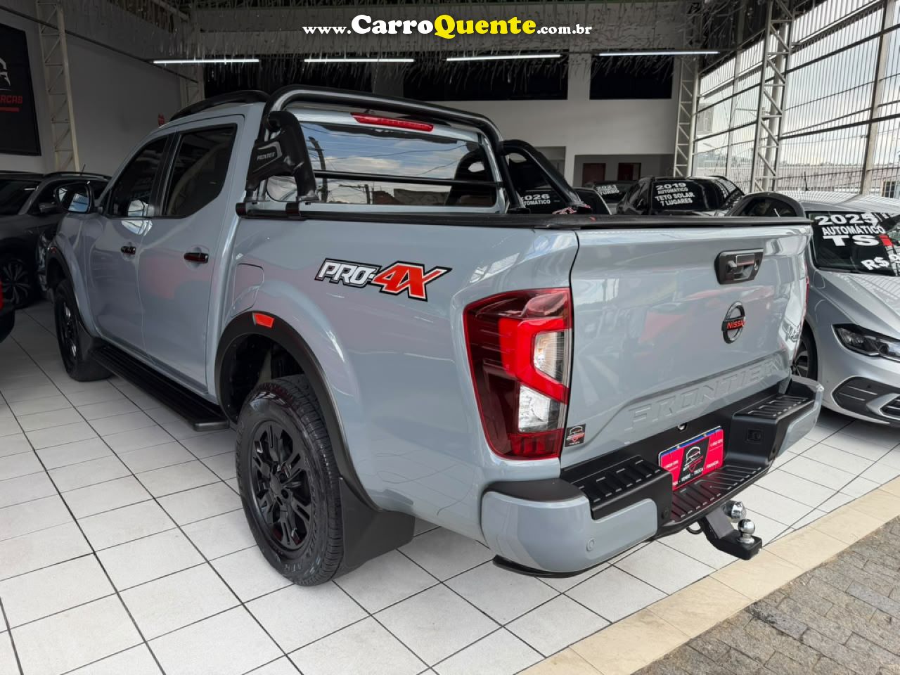 NISSAN   FRONTIER PRO4X CD 4X4 2.3 BI-TB DIE. AUT   CINZA 2023 2.3 GASOLINA - Loja