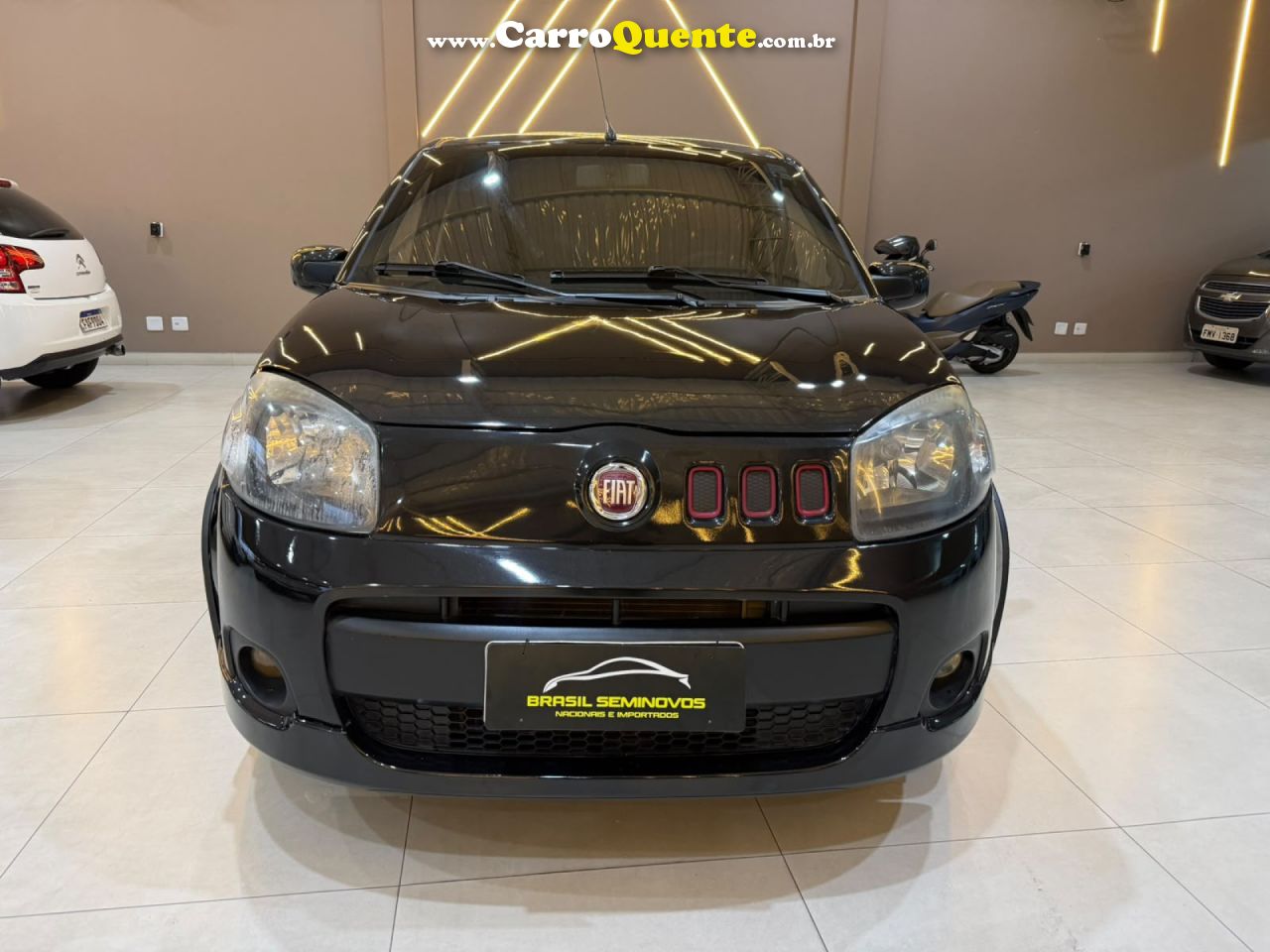 FIAT   UNO SPORTING    CINZA 2013 1.4 FLEX - Loja