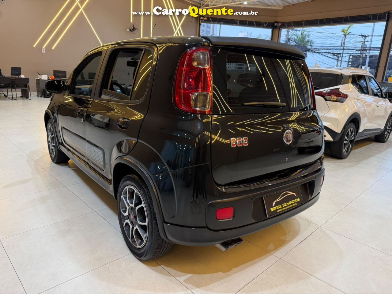 FIAT   UNO SPORTING    CINZA 2013 1.4 FLEX - Loja
