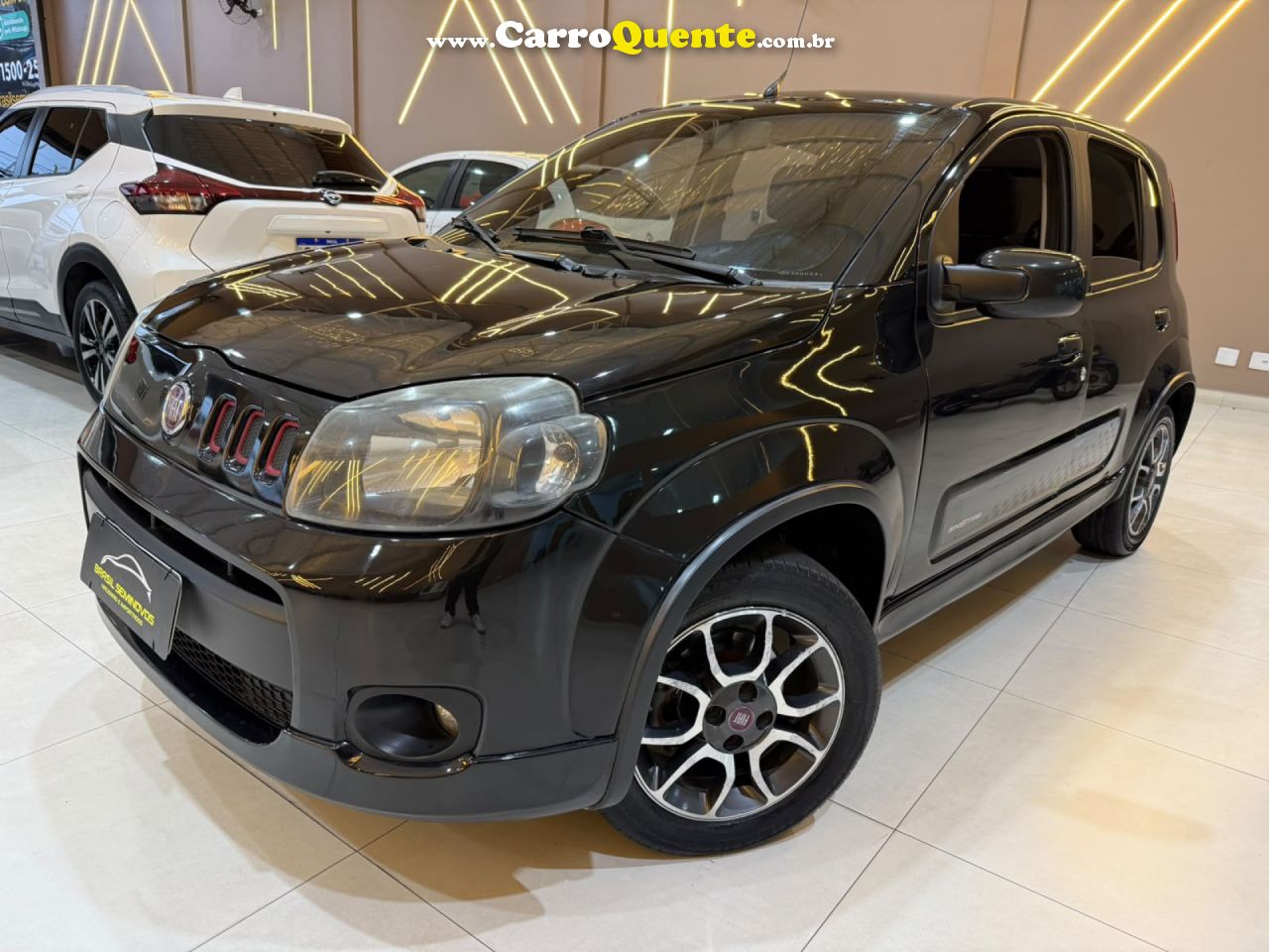 FIAT   UNO SPORTING    CINZA 2013 1.4 FLEX - Loja