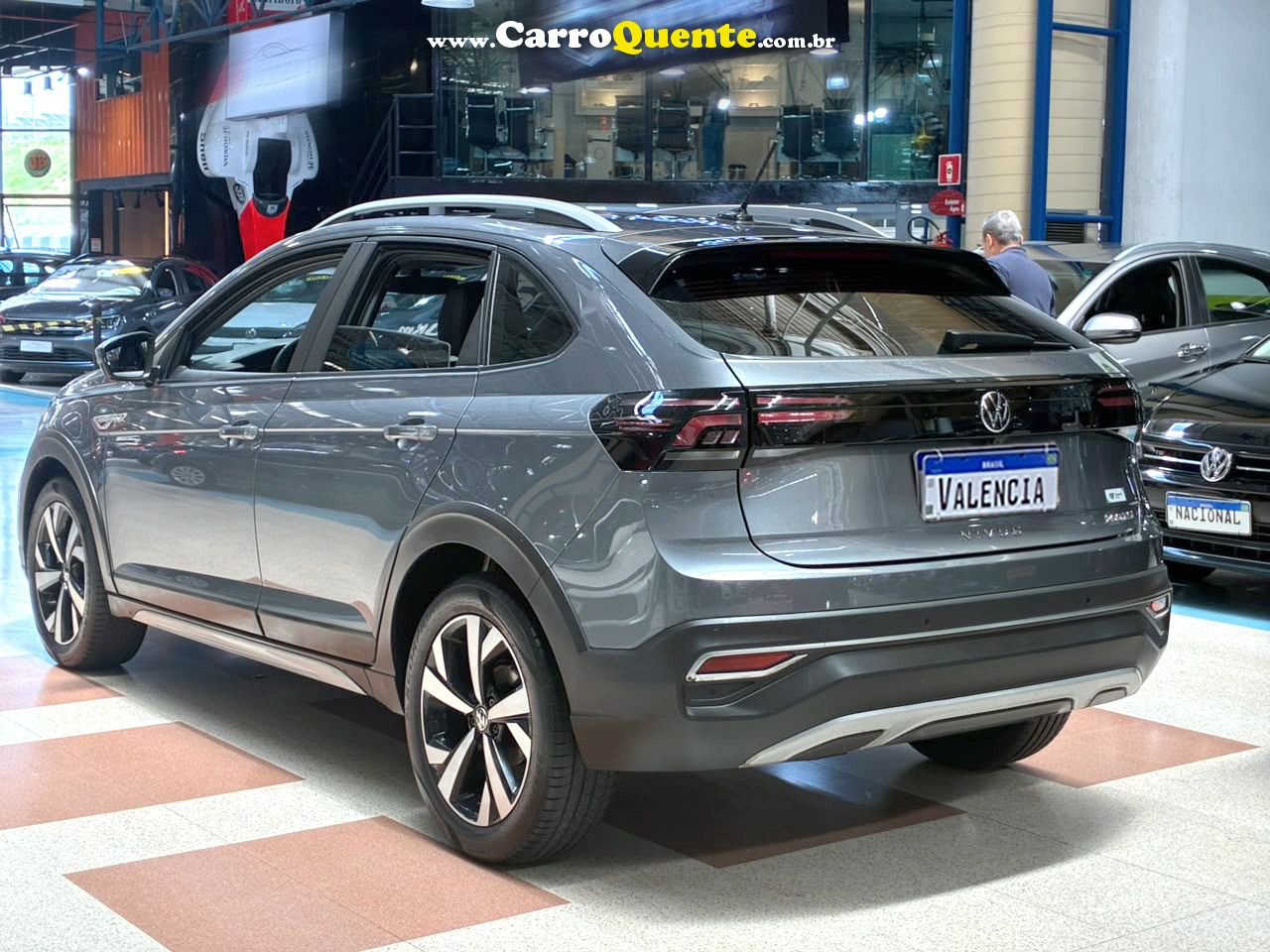 VOLKSWAGEN NIVUS 1.0 200 TSI TOTAL HIGHLINE 2024 - Loja