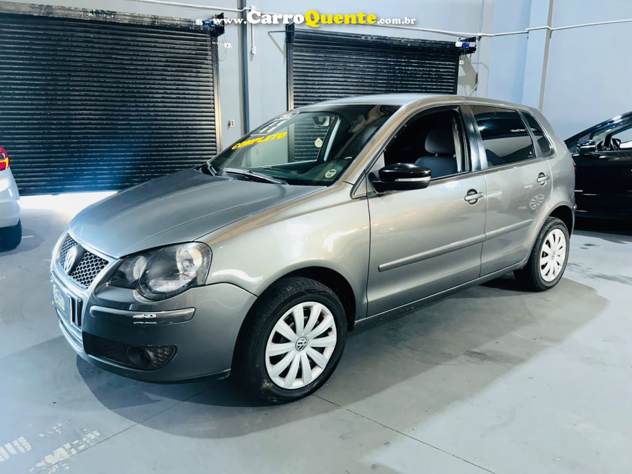 VOLKSWAGEN   POLO 1.6 MIS.OURO 1.6 MI TOT.FLEX 8V 5P   CINZA 2011 1.6 GASOLINA - Loja