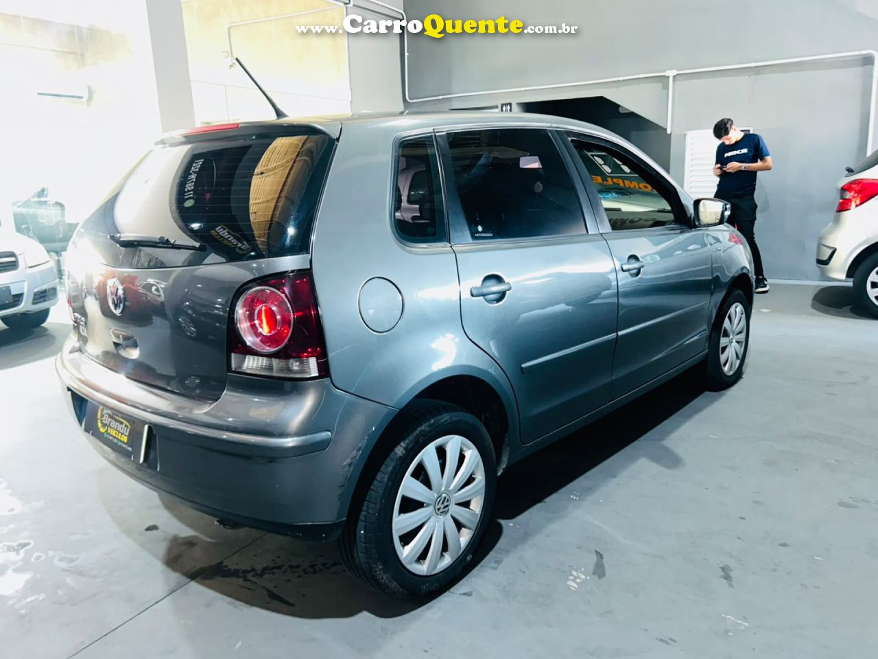 VOLKSWAGEN   POLO 1.6 MIS.OURO 1.6 MI TOT.FLEX 8V 5P   CINZA 2011 1.6 GASOLINA - Loja