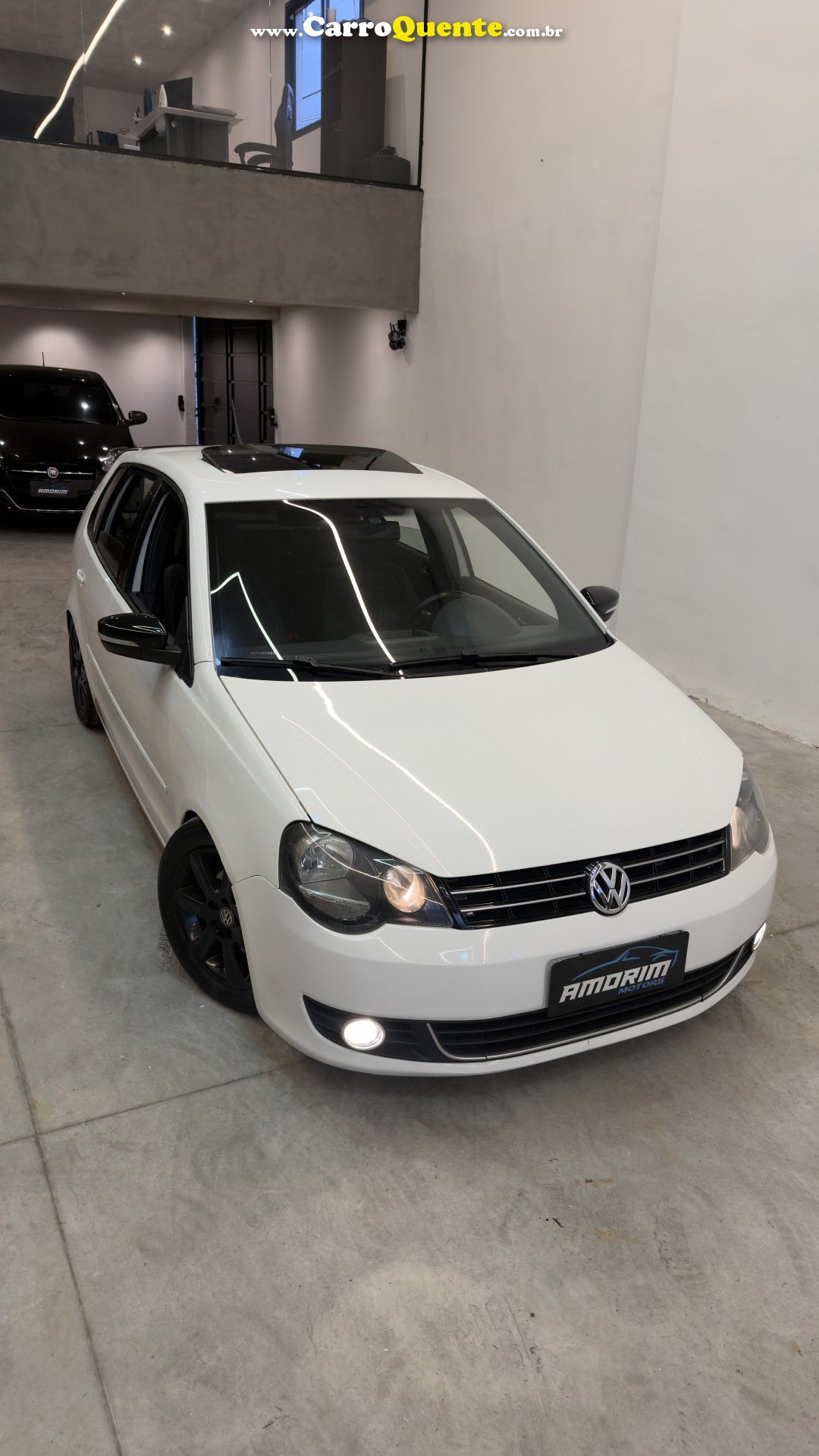 VOLKSWAGEN   POLO SPORTLINE I MOTION 1.6 T.FLEX 5P   BRANCO 2013 1.6 GASOLINA - Loja