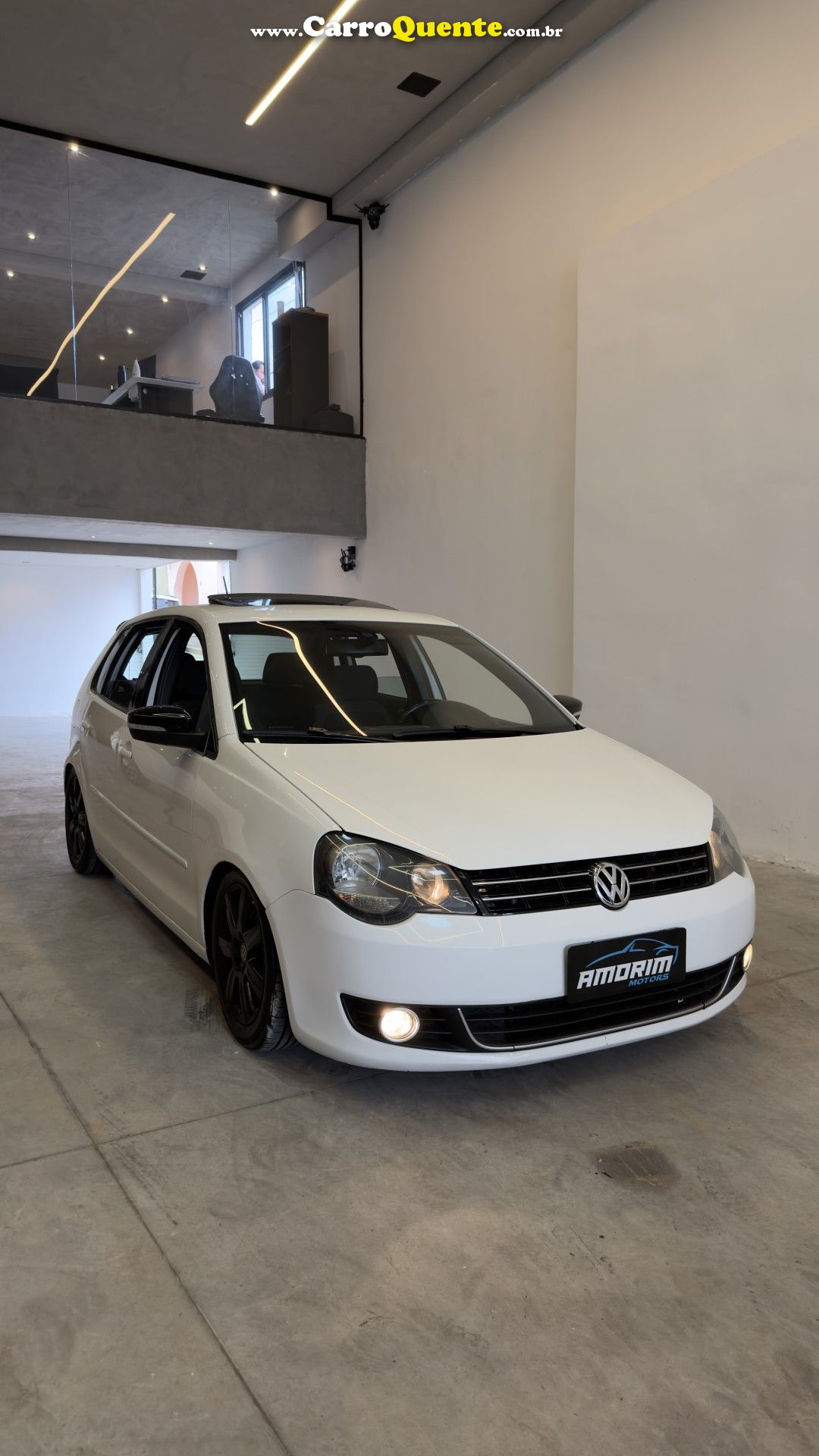 VOLKSWAGEN   POLO SPORTLINE I MOTION 1.6 T.FLEX 5P   BRANCO 2013 1.6 GASOLINA - Loja