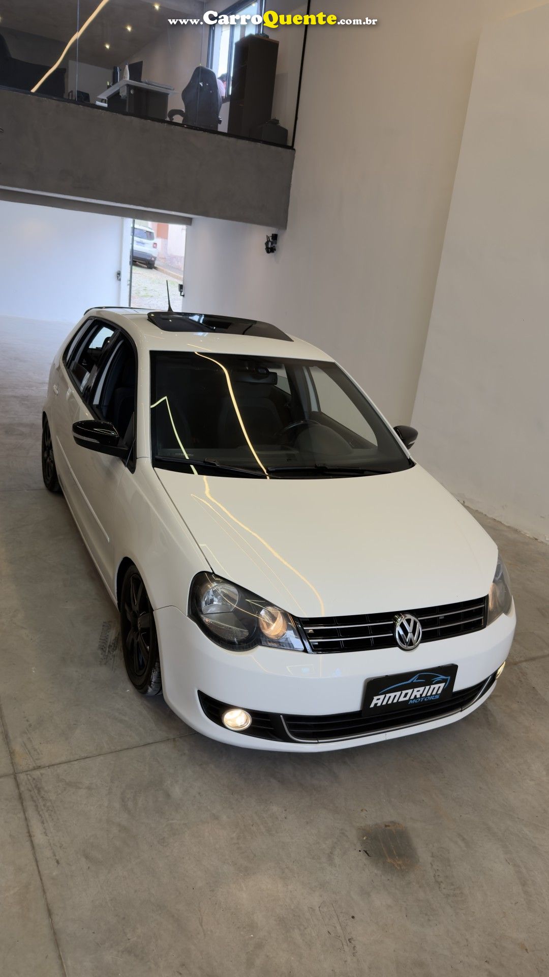 VOLKSWAGEN   POLO SPORTLINE I MOTION 1.6 T.FLEX 5P   BRANCO 2013 1.6 GASOLINA - Loja