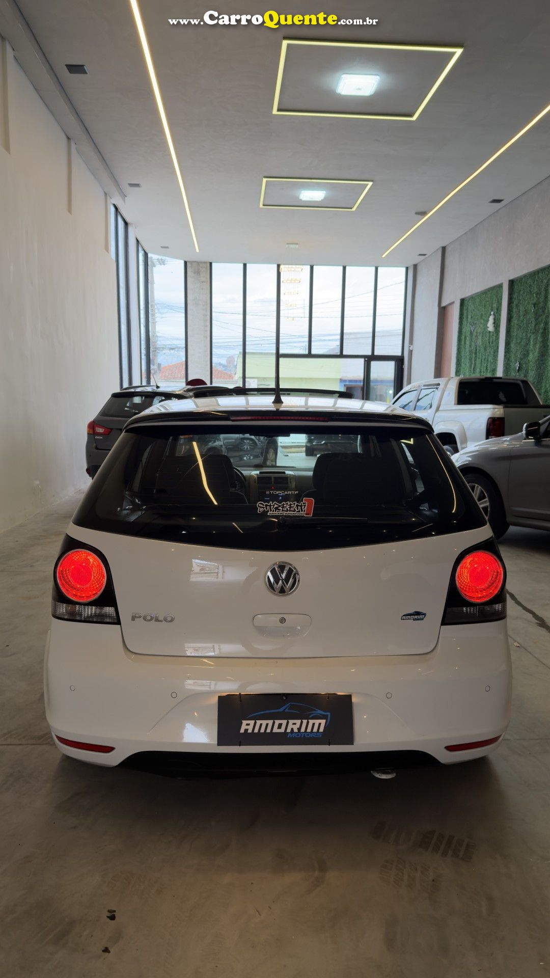 VOLKSWAGEN   POLO SPORTLINE I MOTION 1.6 T.FLEX 5P   BRANCO 2013 1.6 GASOLINA - Loja
