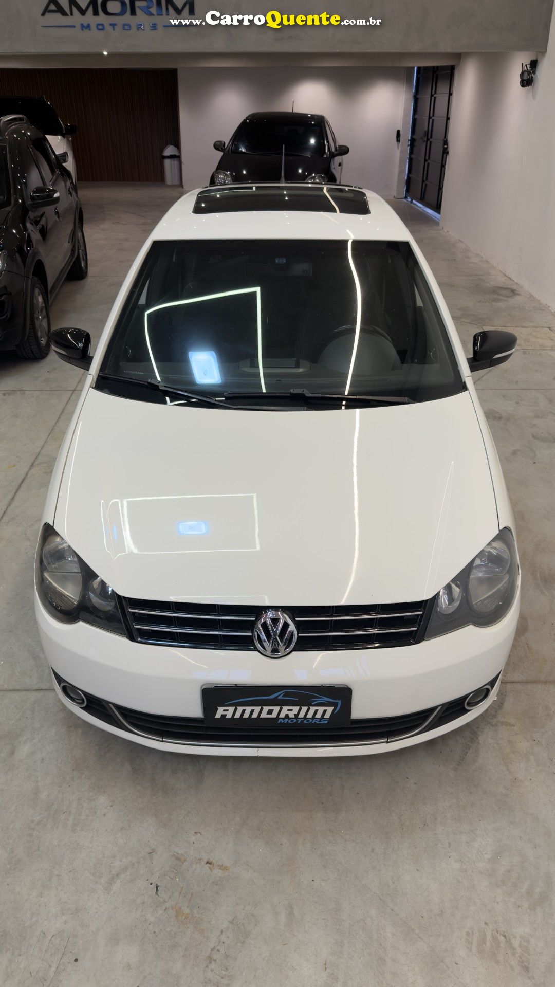 VOLKSWAGEN   POLO SPORTLINE I MOTION 1.6 T.FLEX 5P   BRANCO 2013 1.6 GASOLINA - Loja