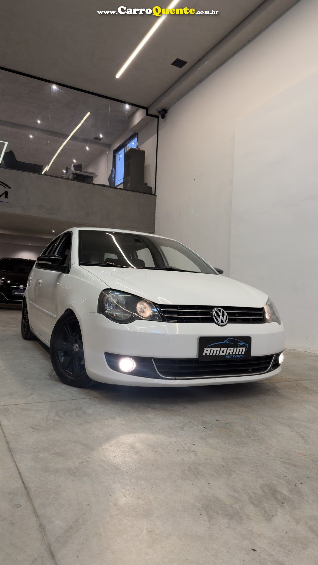 VOLKSWAGEN   POLO SPORTLINE I MOTION 1.6 T.FLEX 5P   BRANCO 2013 1.6 GASOLINA - Loja