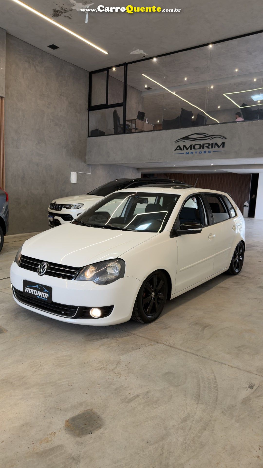VOLKSWAGEN   POLO SPORTLINE I MOTION 1.6 T.FLEX 5P   BRANCO 2013 1.6 GASOLINA - Loja