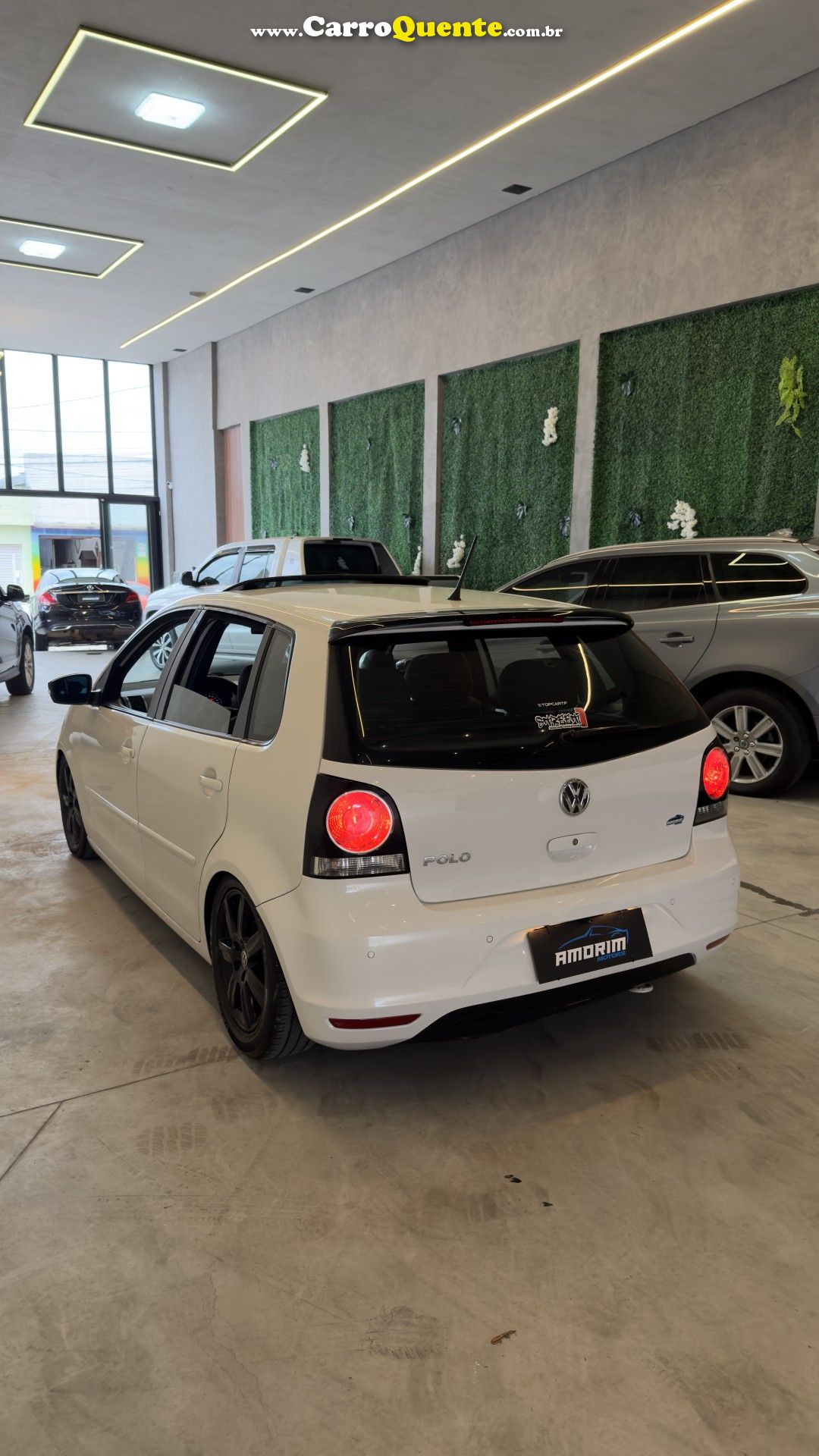 VOLKSWAGEN   POLO SPORTLINE I MOTION 1.6 T.FLEX 5P   BRANCO 2013 1.6 GASOLINA - Loja