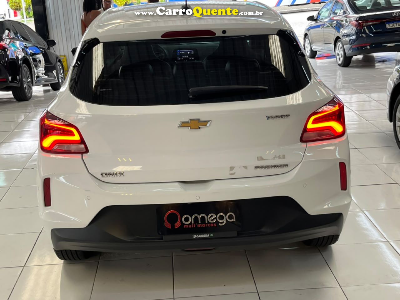 CHEVROLET   ONIX HATCH PREM. 1.0 12V TB FLEX 5P AUT.   BRANCO 2020 1.0 FLEX - Loja