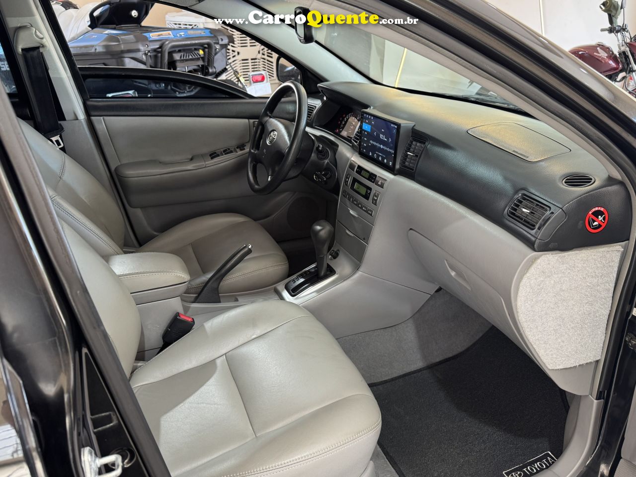 TOYOTA   COROLLA SE-G 1.81.8 FLEX 16V AUT.   PRETO 2006 1.8 GASOLINA - Loja