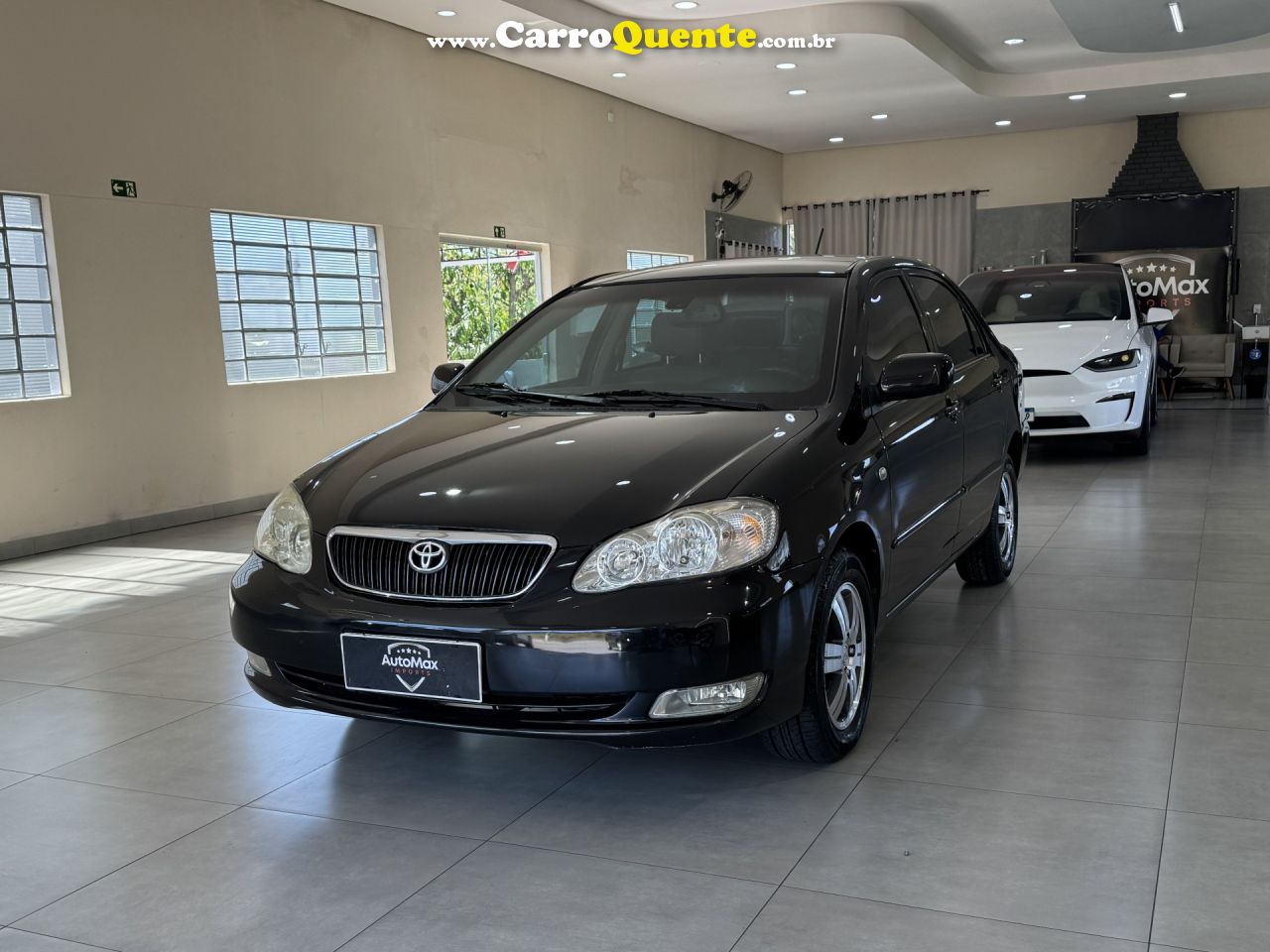 TOYOTA   COROLLA SE-G 1.81.8 FLEX 16V AUT.   PRETO 2006 1.8 GASOLINA - Loja