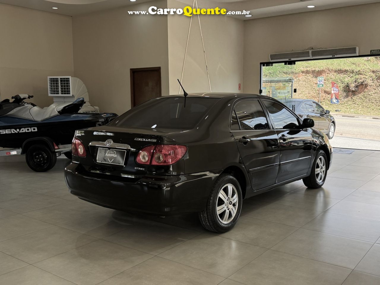 TOYOTA   COROLLA SE-G 1.81.8 FLEX 16V AUT.   PRETO 2006 1.8 GASOLINA - Loja