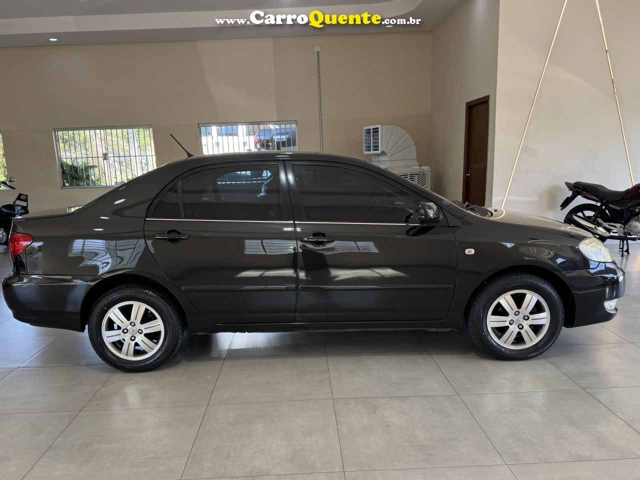 TOYOTA   COROLLA SE-G 1.81.8 FLEX 16V AUT.   PRETO 2006 1.8 GASOLINA - Loja