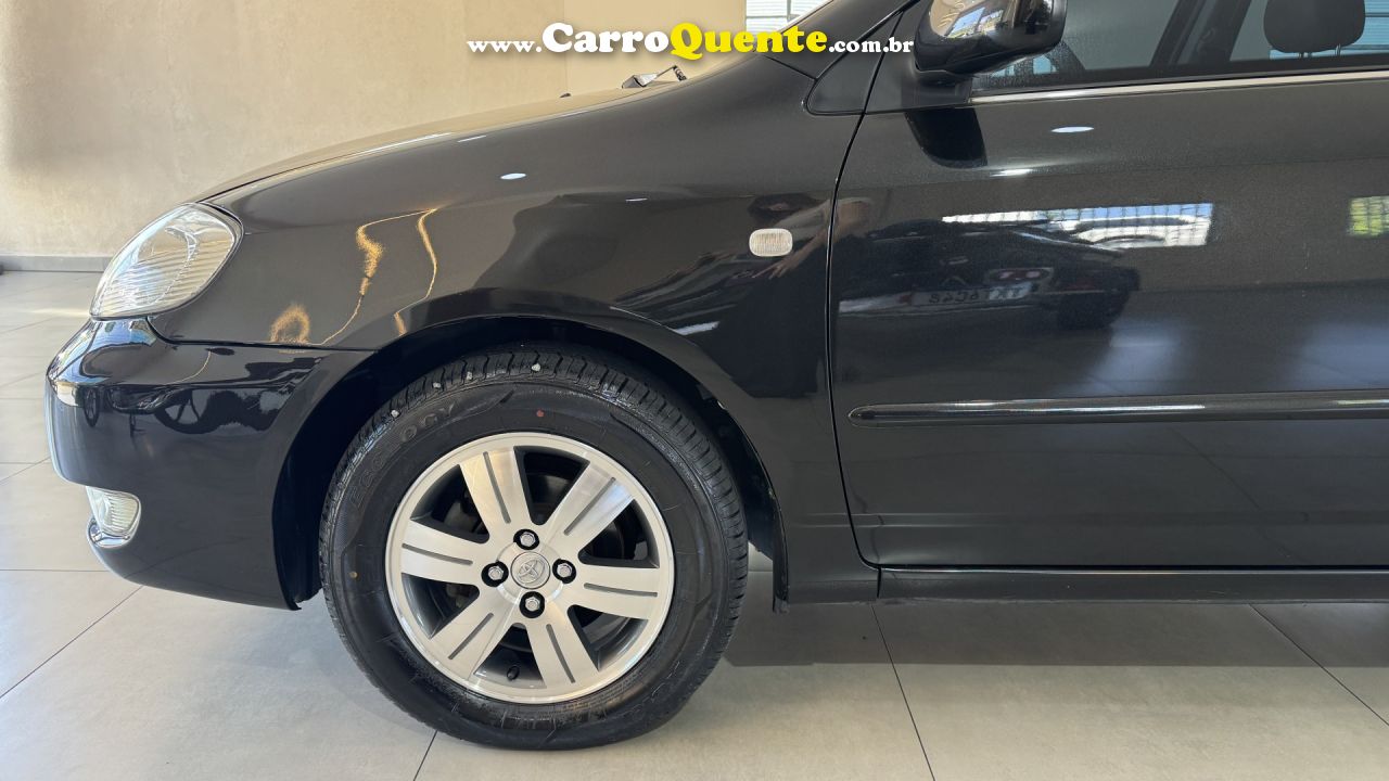 TOYOTA   COROLLA SE-G 1.81.8 FLEX 16V AUT.   PRETO 2006 1.8 GASOLINA - Loja
