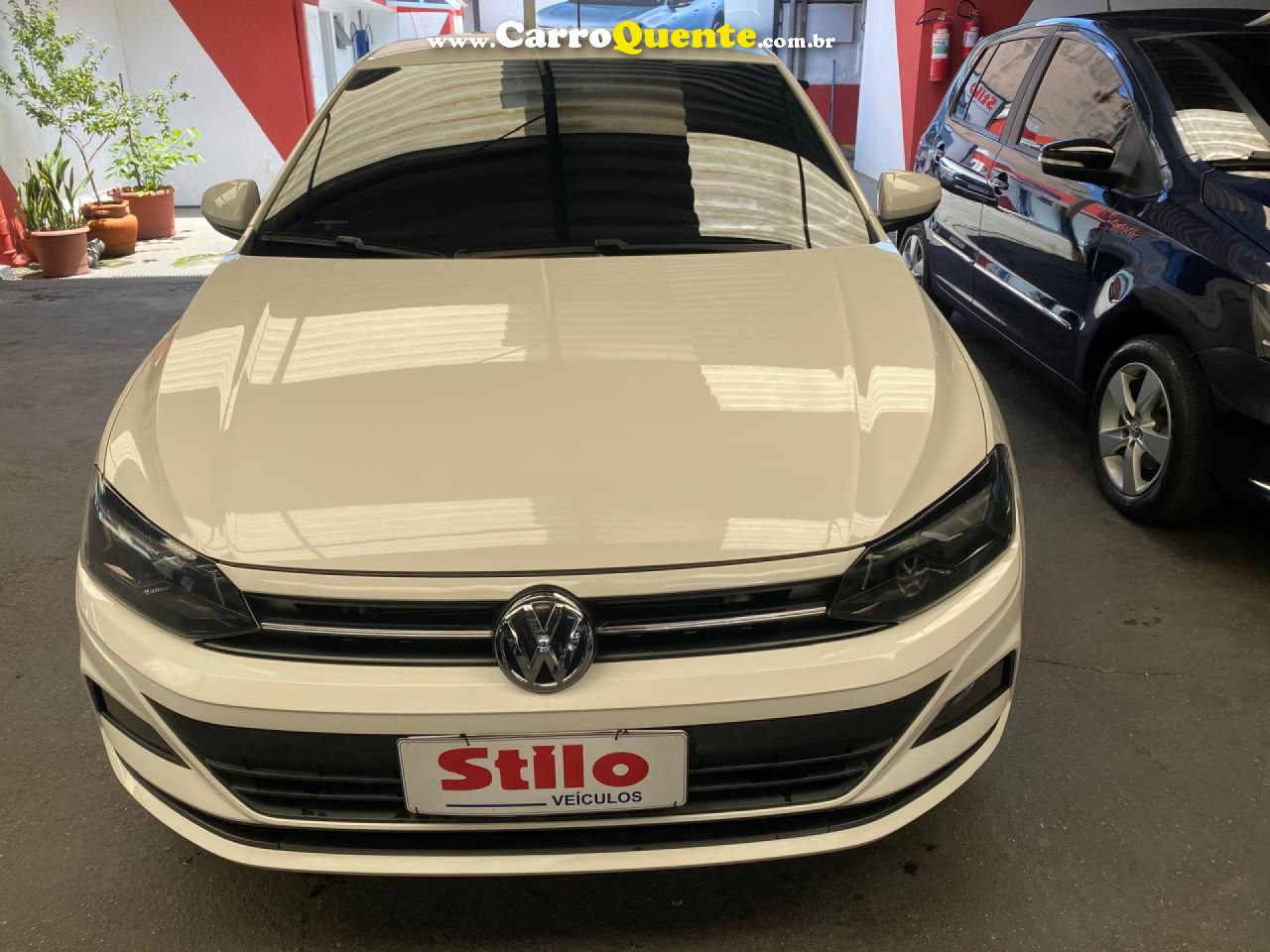 VOLKSWAGEN   POLO COMFORT. 200 TSI 1.0 FLEX 12V AUT.   BRANCO 2018 1.0 FLEX - Loja