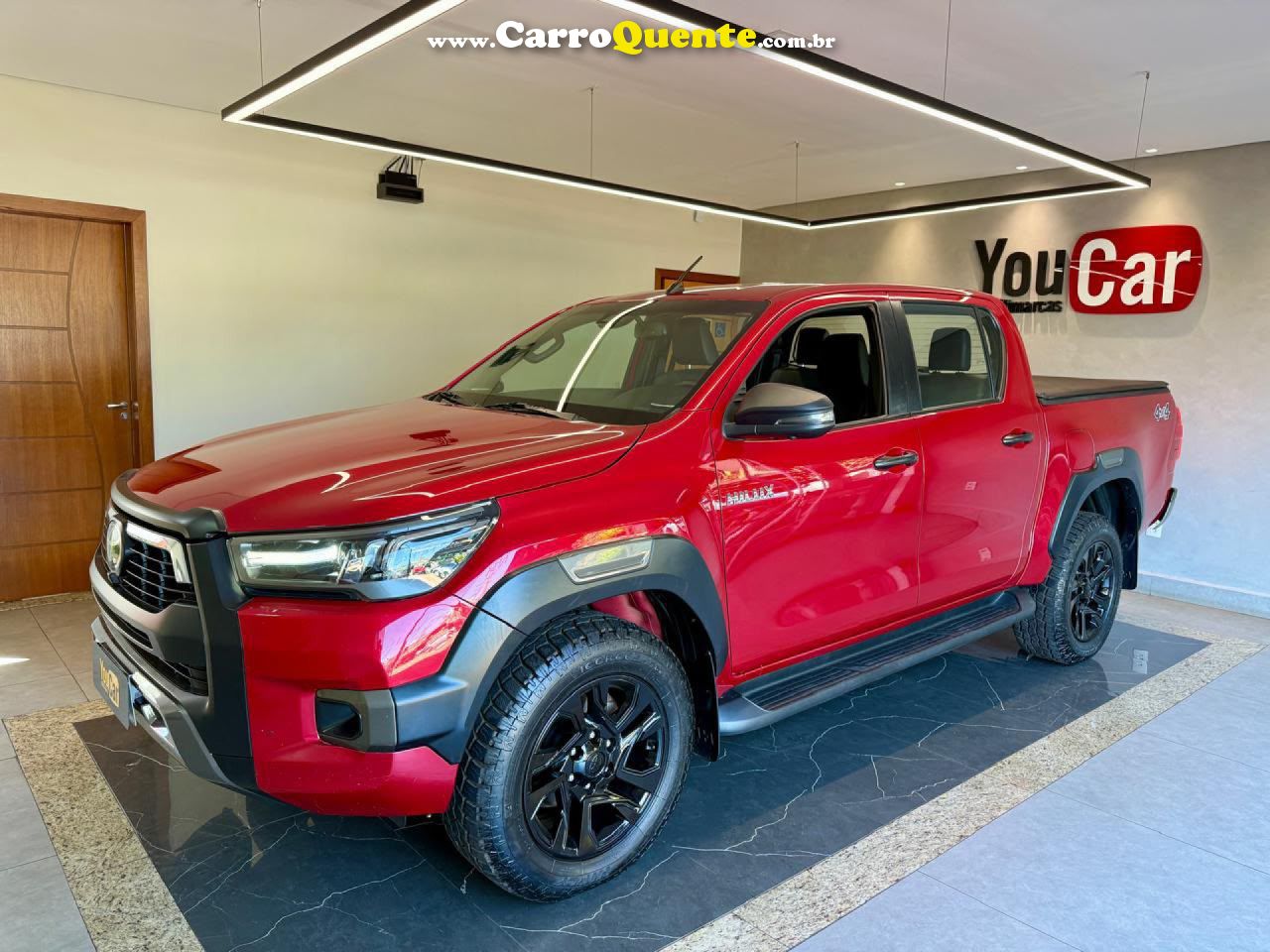 TOYOTA   HILUX CD CONQUEST 4X4 2.8  DIE.AUT   VERMELHO 2024 2.8 DIESEL - Loja