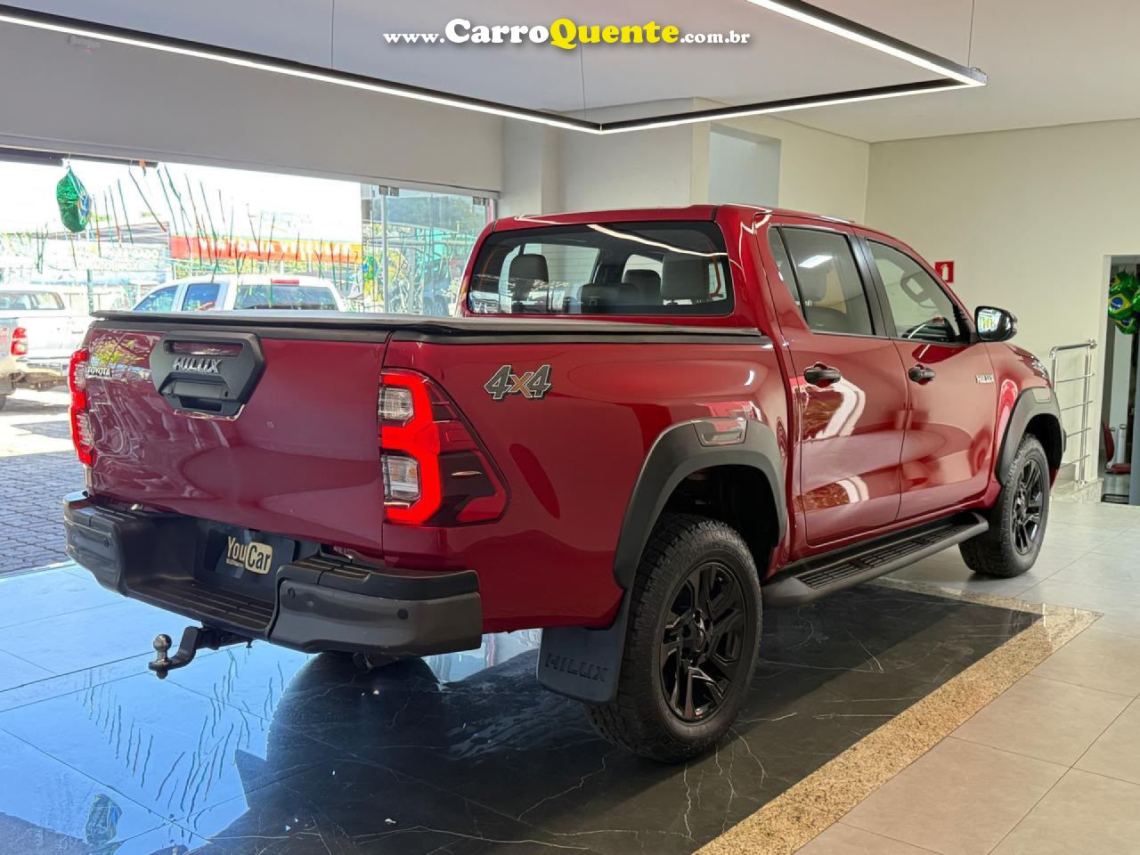 TOYOTA   HILUX CD CONQUEST 4X4 2.8  DIE.AUT   VERMELHO 2024 2.8 DIESEL - Loja
