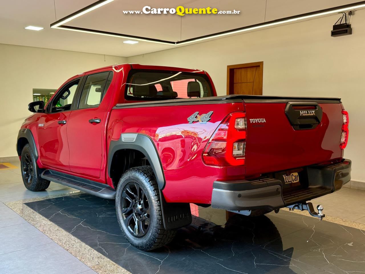 TOYOTA   HILUX CD CONQUEST 4X4 2.8  DIE.AUT   VERMELHO 2024 2.8 DIESEL - Loja