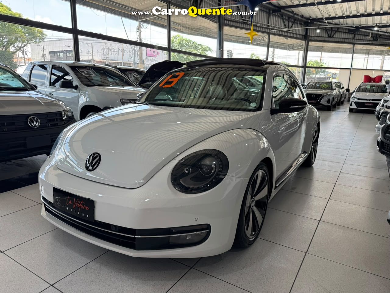 VOLKSWAGEN FUSCA 2.0 TSI SPORT 16V 2013 - Loja