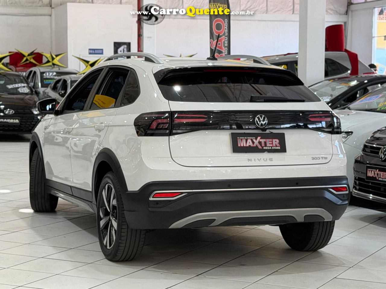 VOLKSWAGEN NIVUS 1.0 200 TSI TOTAL HIGHLINE 2023 - Loja