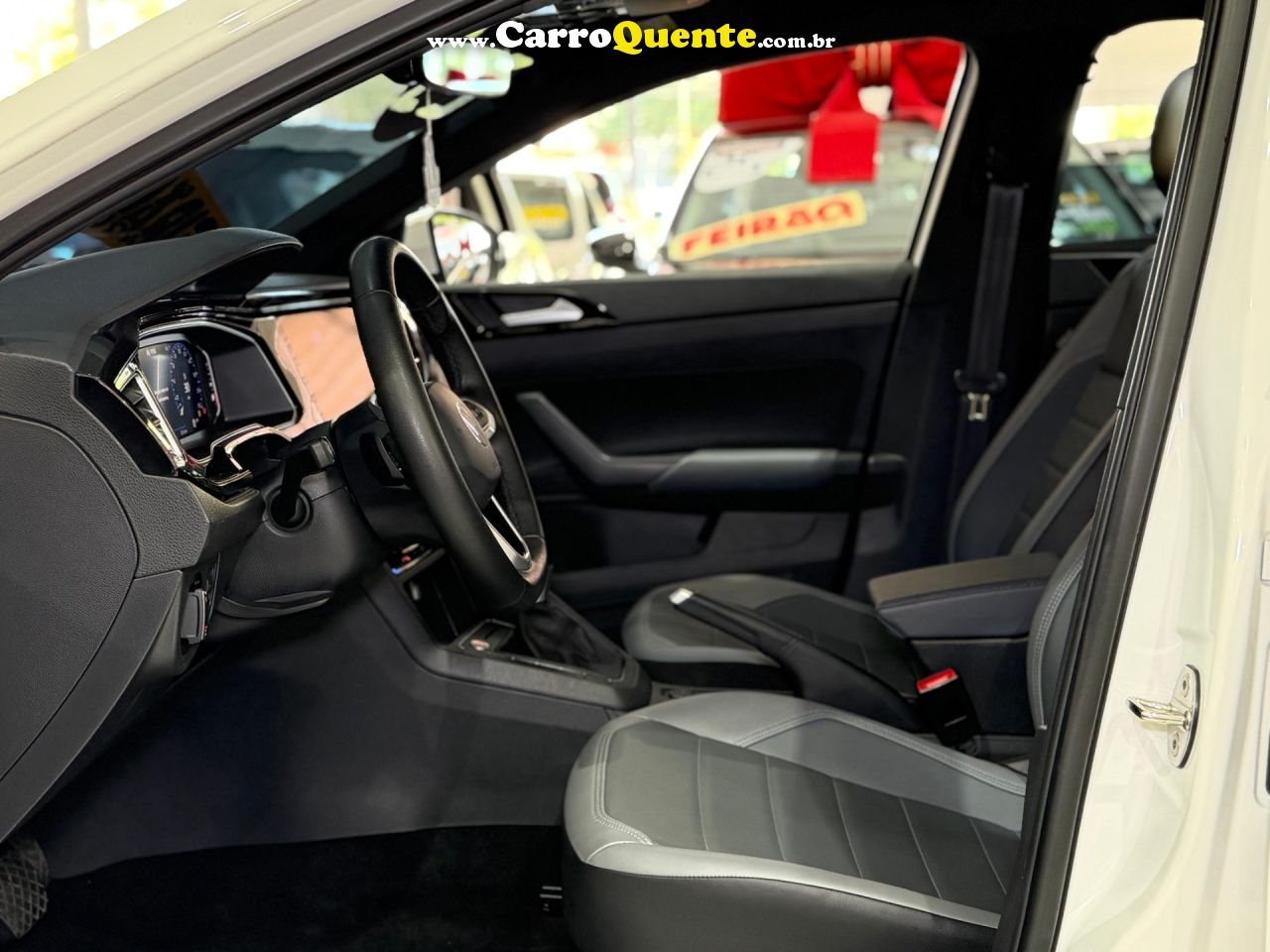 VOLKSWAGEN NIVUS 1.0 200 TSI TOTAL HIGHLINE 2023 - Loja