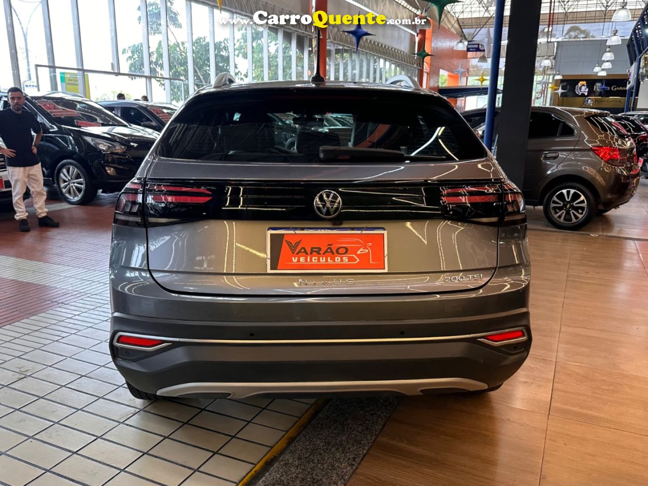 VOLKSWAGEN NIVUS 1.0 200 TSI TOTAL HIGHLINE 2024 - Loja