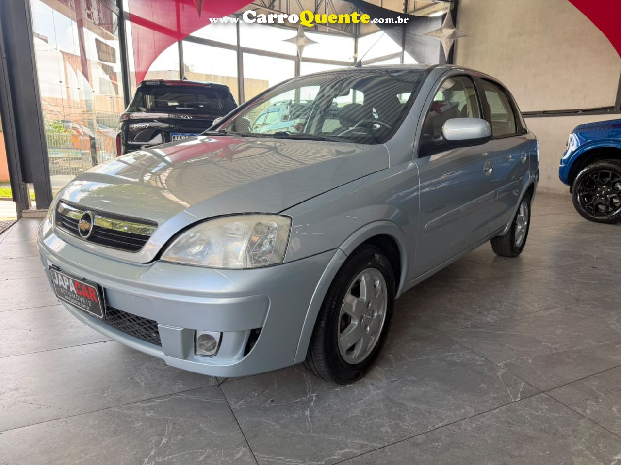 CHEVROLET   CORSA SED. PREMIUM 1.4 8V ECONOFLEX 4P   PRATA 2009 1.4 GASOLINA - Loja