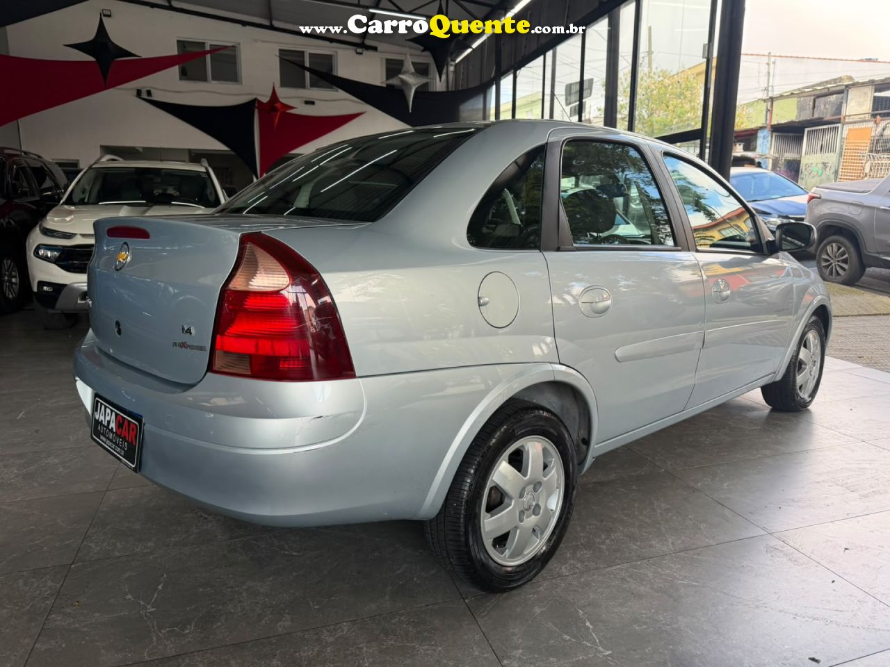 CHEVROLET   CORSA SED. PREMIUM 1.4 8V ECONOFLEX 4P   PRATA 2009 1.4 GASOLINA - Loja