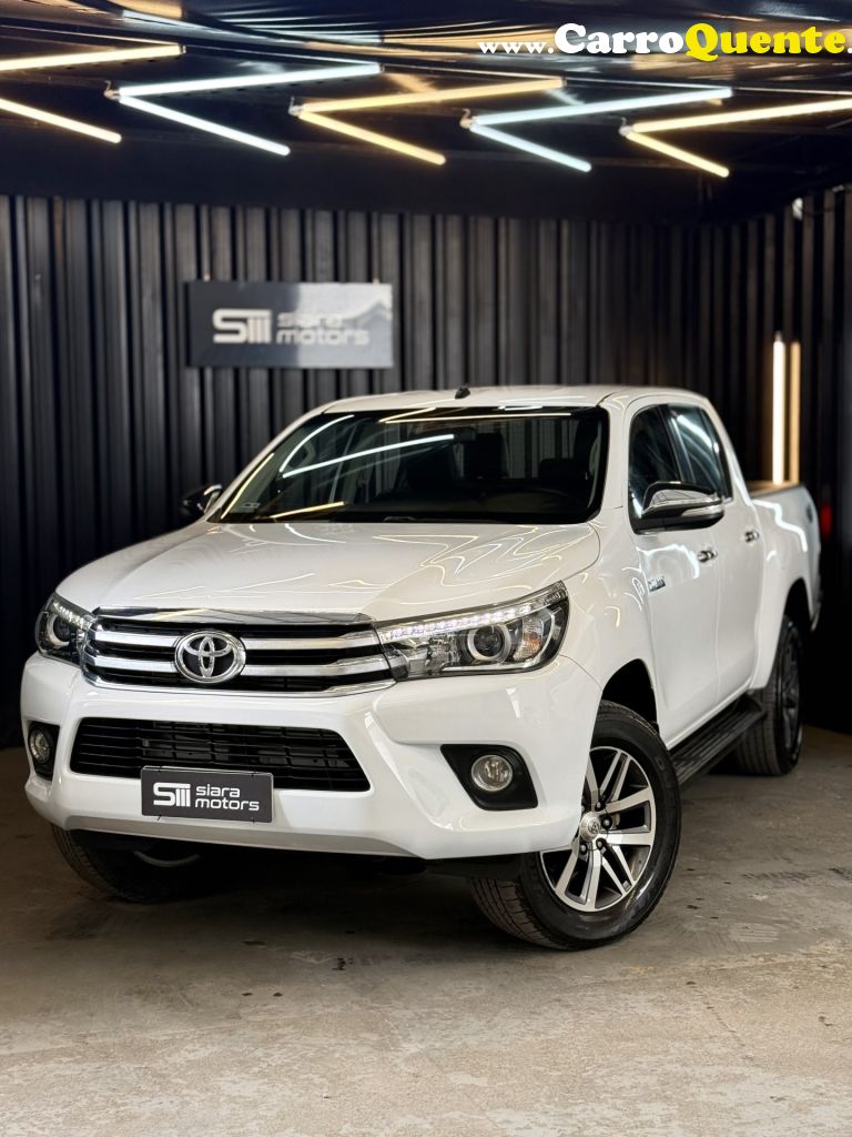 TOYOTA   HILUX CD SRX 4X4 2.8 TDI 16V DIESEL AUT.   BRANCO 2016 2.8 DIESEL - Loja