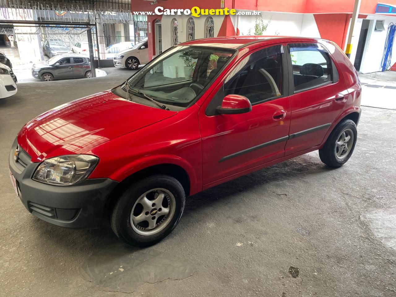 CHEVROLET   CELTA SPIRIT LT 1.0 MPFI 8V FLEXP. 5P   VERMELHO 2014 1.0 FLEX - Loja