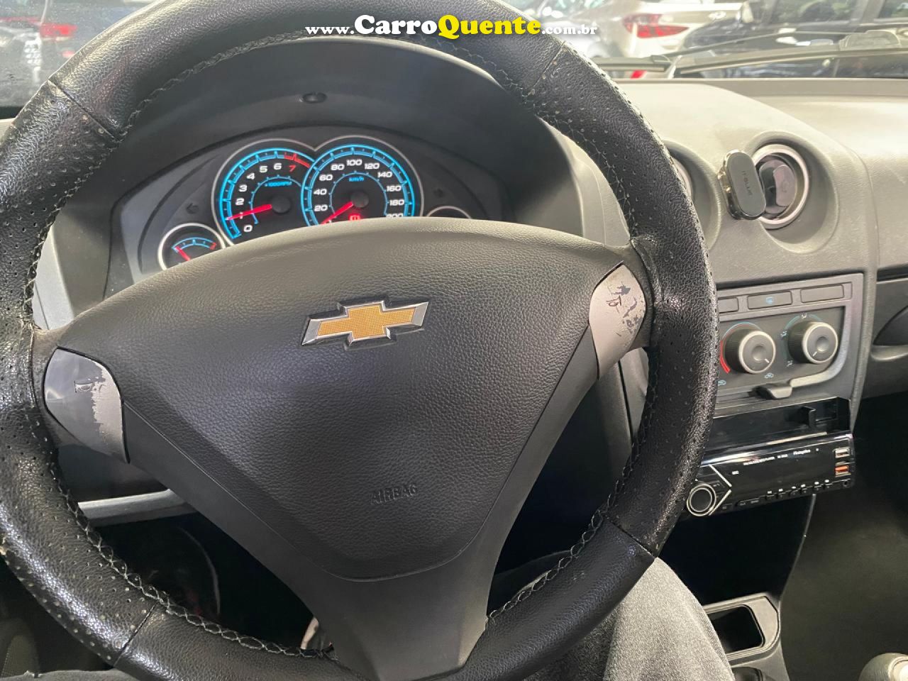 CHEVROLET   CELTA SPIRIT LT 1.0 MPFI 8V FLEXP. 5P   VERMELHO 2014 1.0 FLEX - Loja