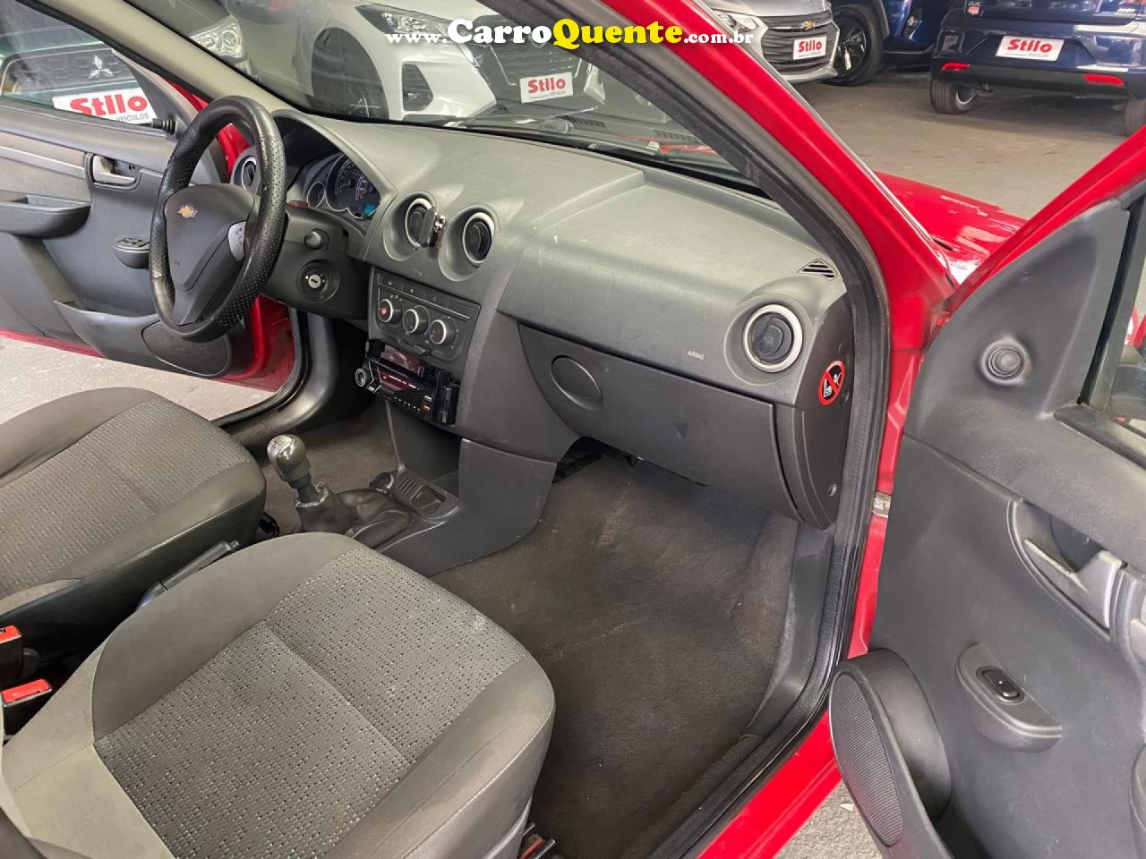CHEVROLET   CELTA SPIRIT LT 1.0 MPFI 8V FLEXP. 5P   VERMELHO 2014 1.0 FLEX - Loja
