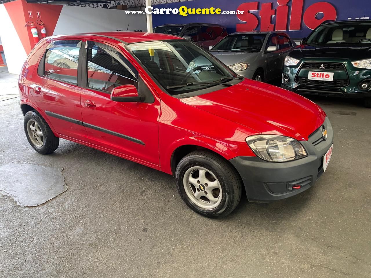 CHEVROLET   CELTA SPIRIT LT 1.0 MPFI 8V FLEXP. 5P   VERMELHO 2014 1.0 FLEX - Loja