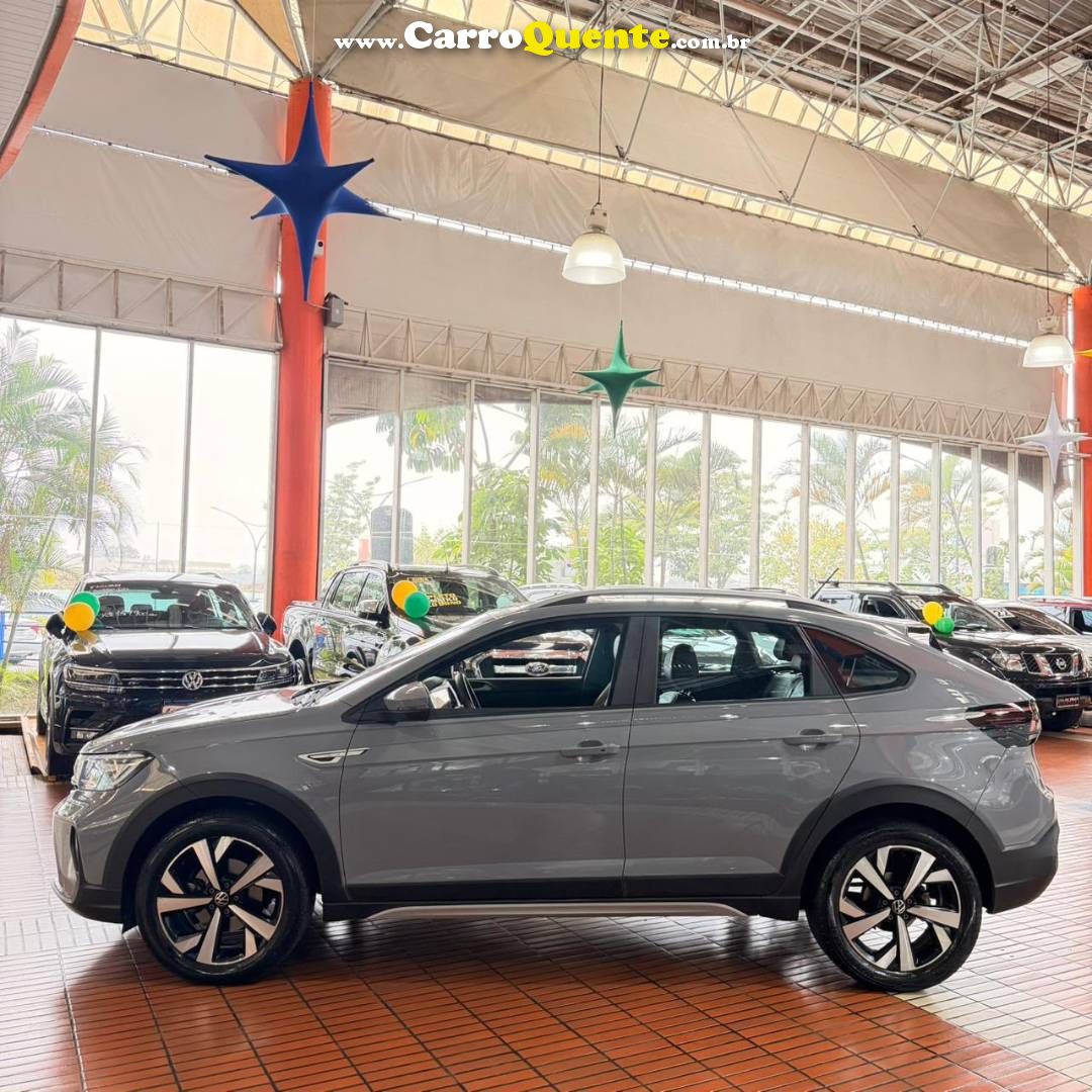 VOLKSWAGEN NIVUS 1.0 200 TSI TOTAL HIGHLINE 2023 - Loja
