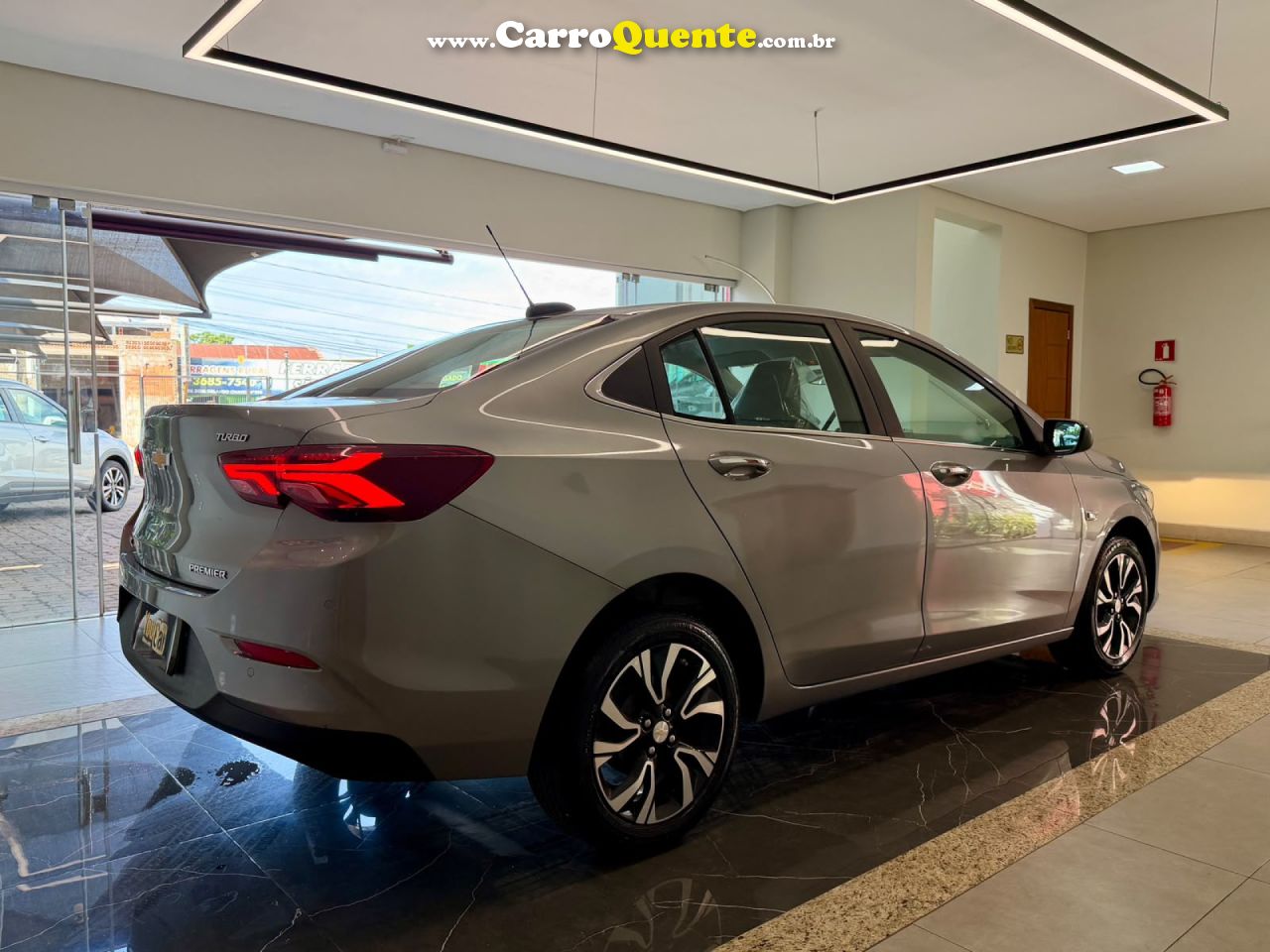 CHEVROLET   ONIX SED. PLUS PREM. 1.0 12V TB FLEX AUT   PRATA 2025 1.0 FLEX - Loja