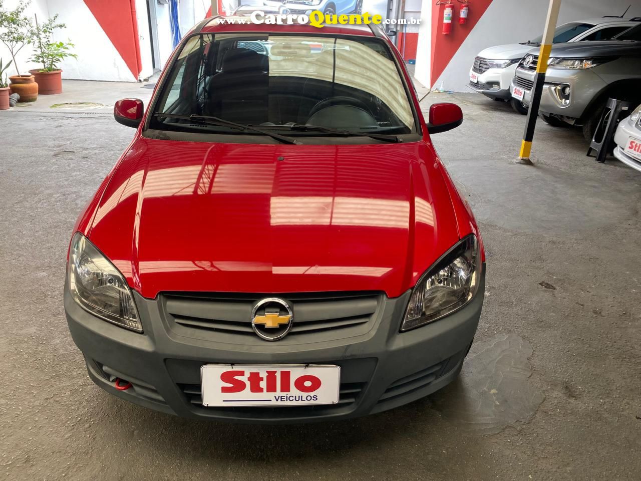 CHEVROLET   CELTA SPIRIT LT 1.0 MPFI 8V FLEXP. 5P   VERMELHO 2014 1.0 FLEX - Loja