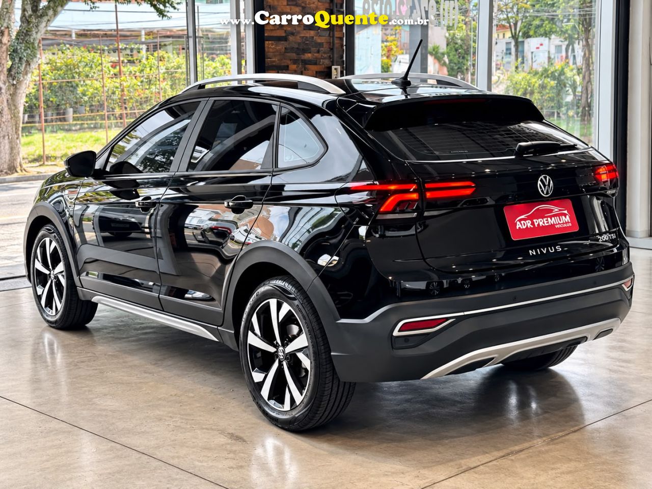 VOLKSWAGEN NIVUS 1.0 200 TSI TOTAL HIGHLINE 2021 - Loja