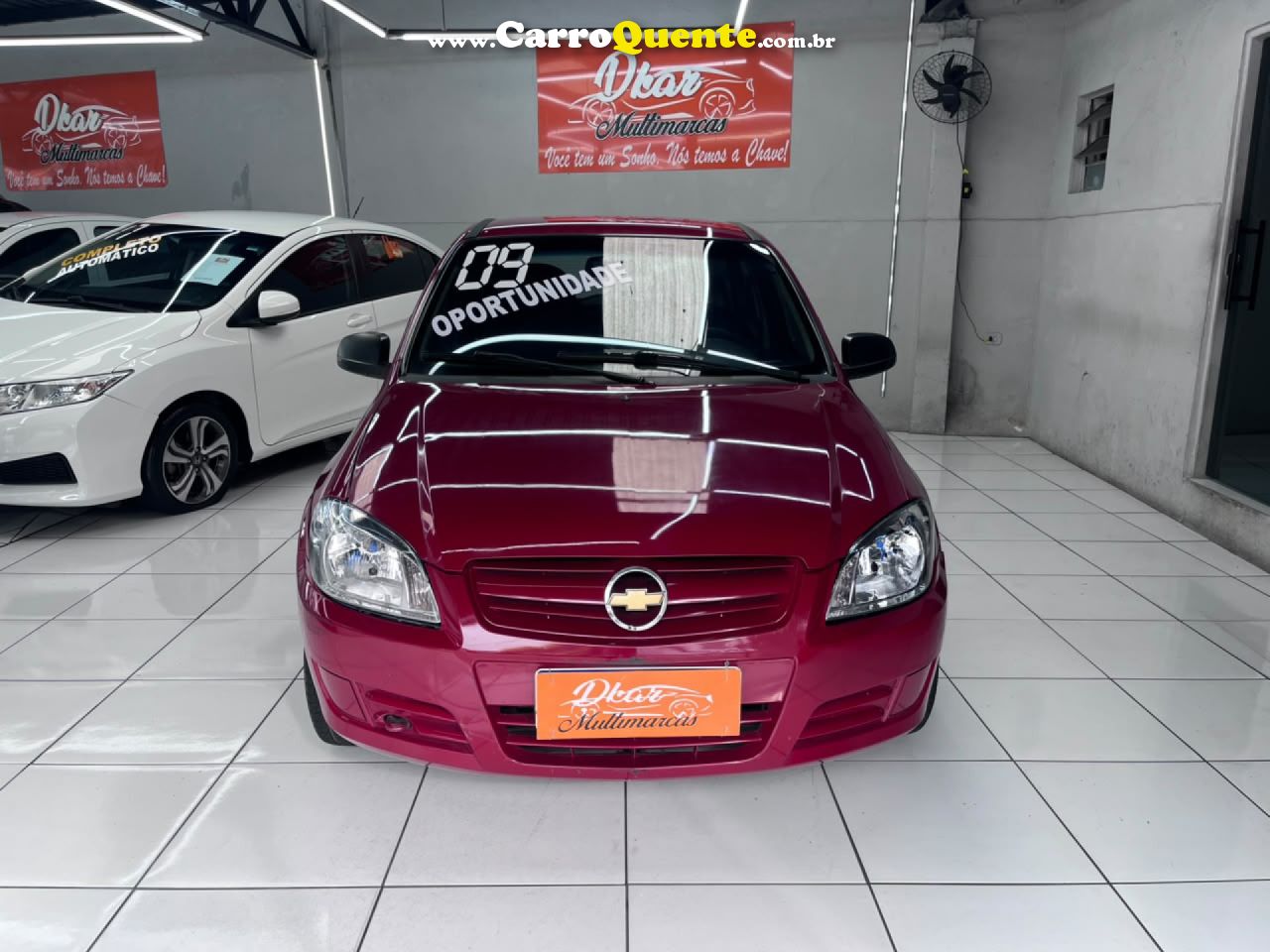 CHEVROLET   CELTA 4P LIFE   VERMELHO 2009 1.0 FLEX - Loja