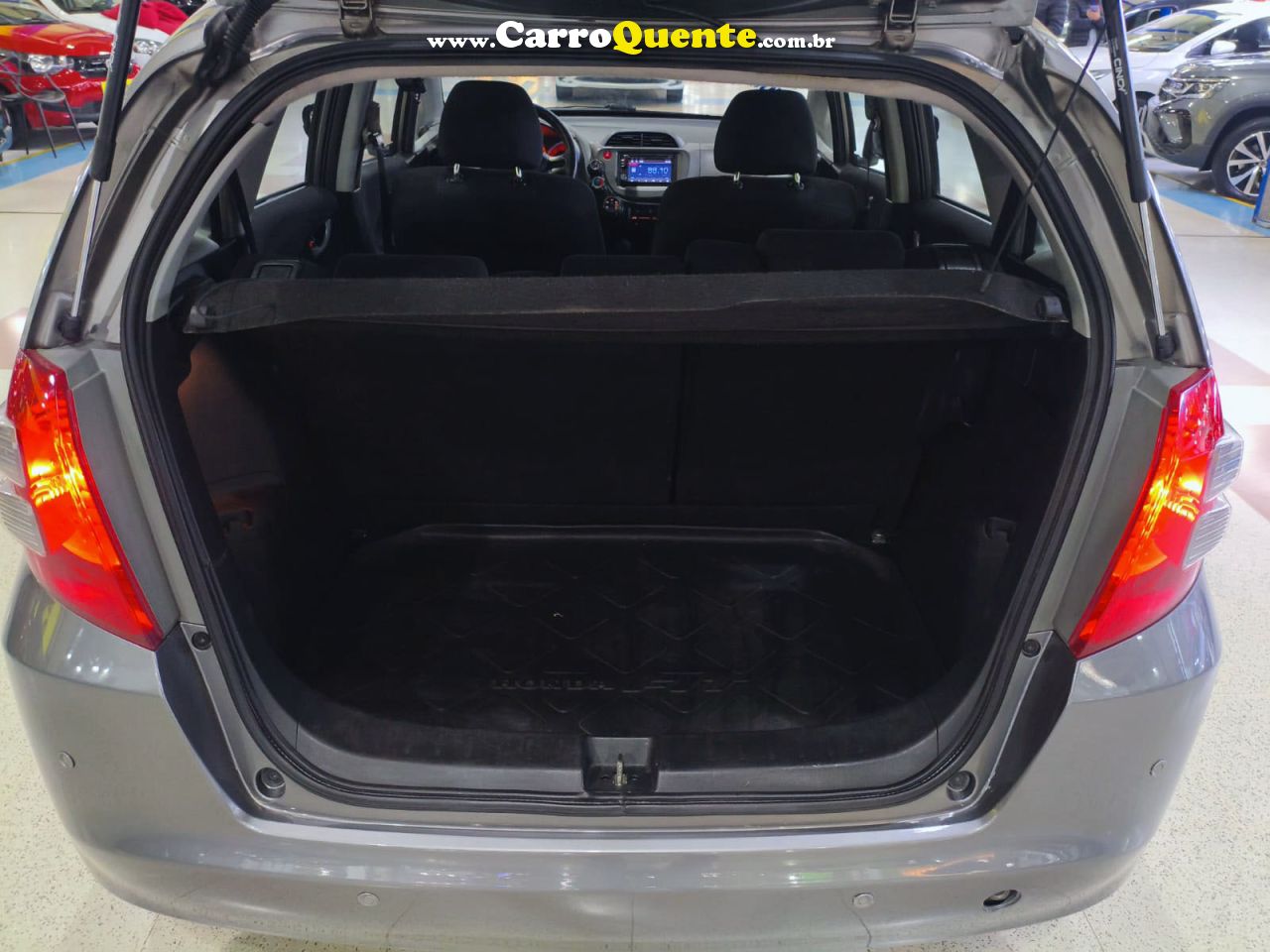 HONDA FIT 2010 1.4 LX AUTOMÁTICO COMPLETO + MULTIMÍDIA 2010 - Loja