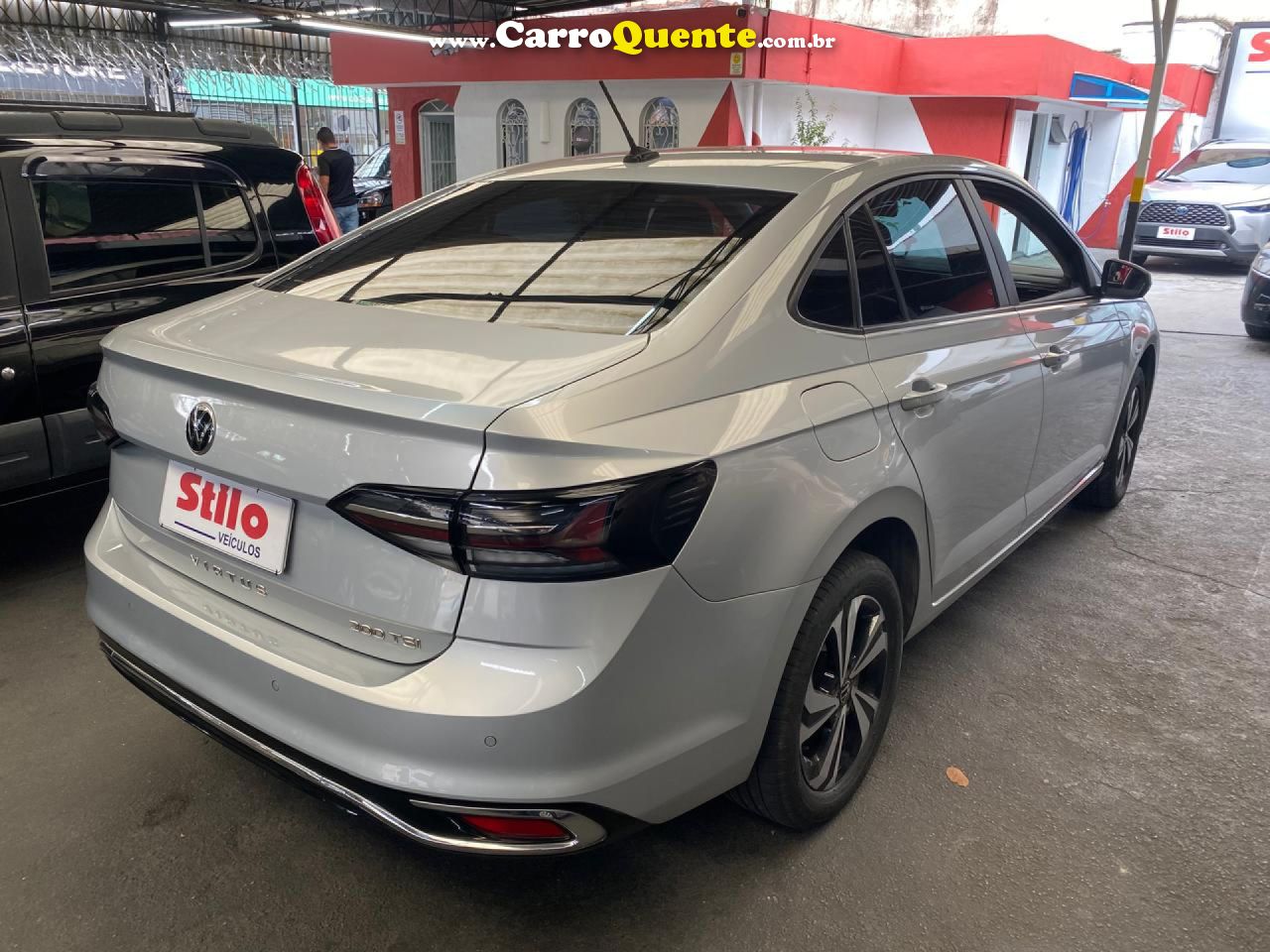 VOLKSWAGEN   VIRTUS COMFORT. 200 TSI 1.0 FLEX 12V AUT   PRATA 2024 1.0 FLEX - Loja