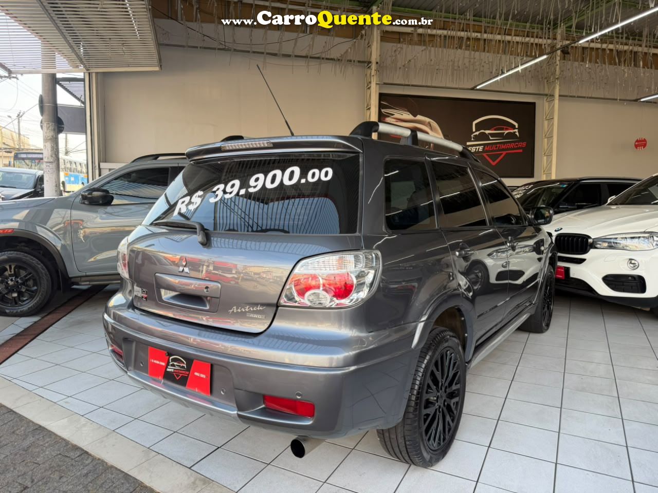 MITSUBISHI   AIRTREK 2.4 16V 163CV 136CV 4X4 5P AUT.   CINZA 2008 2.4 GASOLINA - Loja